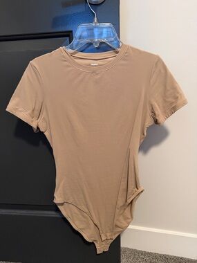 SKIMS Short Sleeve Bodysuit in Tan